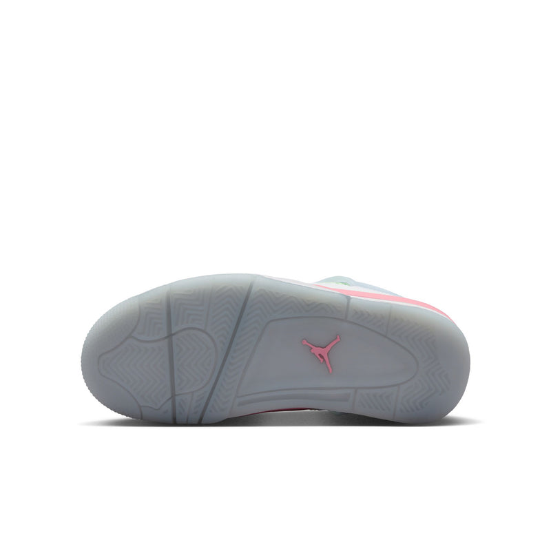 Youth sneakers outsole view: gray rubber sole with pink Jumpman logo and textured tread.