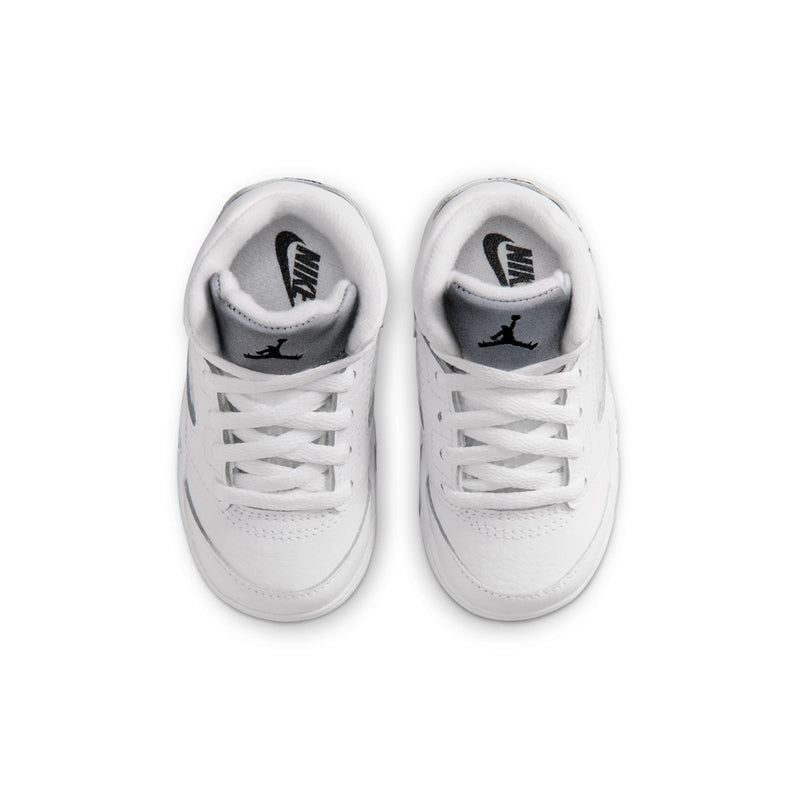 Toddler sneakers front view showing white laces and Nike tongue lining with Jumpman