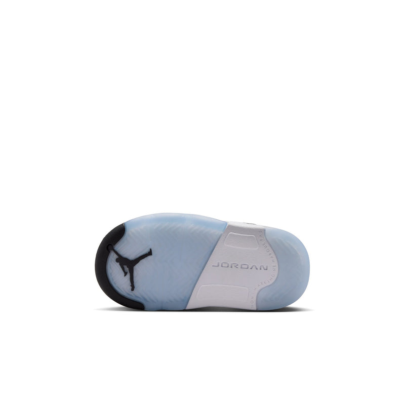 Toddler sneakers showing blue-gray sole with JORDAN branding and heel logo
