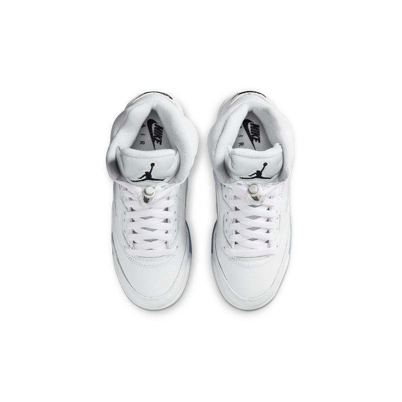 Youth white sneakers, top view of laces and tongue with Jordan 23 label