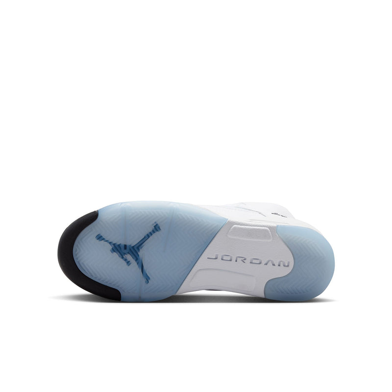 Youth sneaker outsole in light blue and white with JORDAN text and Jumpman