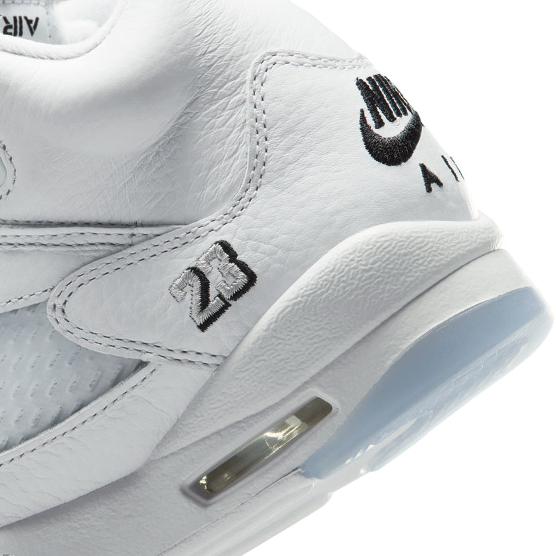 Youth sneaker side close-up with 23 emblem and visible air unit window