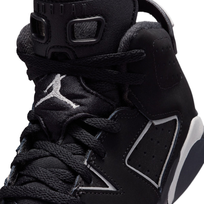 Kids black high-top sneakers close-up of laces and Jumpman logo on side