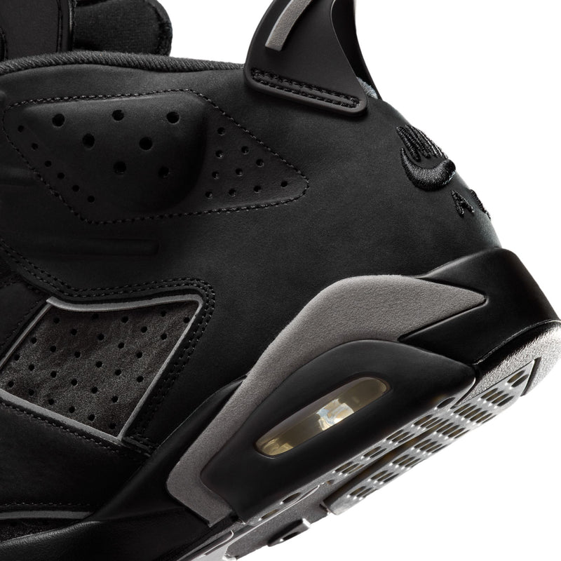 Men's black high-top sneakers, close-up of side panel and air window