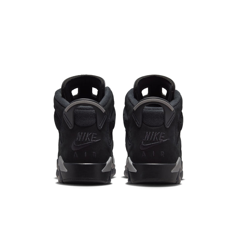 Youth black Nike high-top sneakers, heel view with NIKE AIR branding