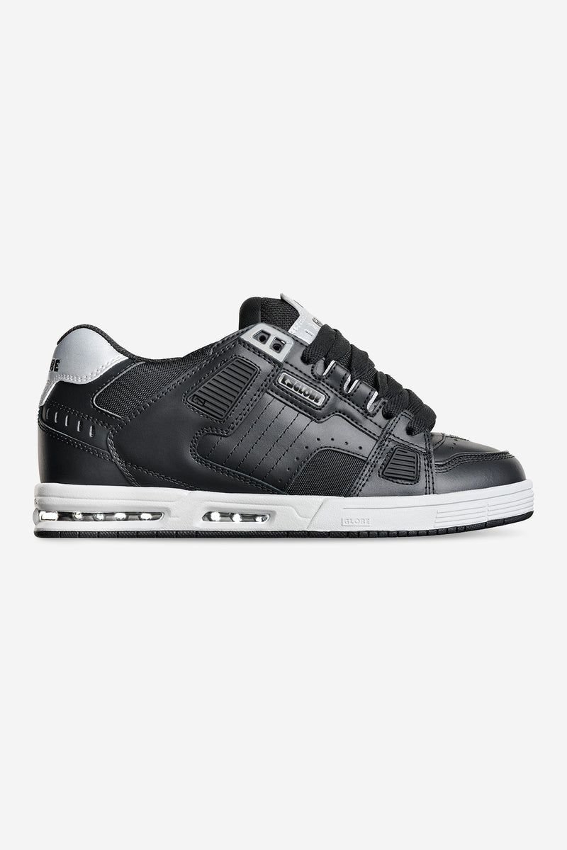 Side view of Sabre skate shoe in black with silver accents and a white sole showing the airbag sole