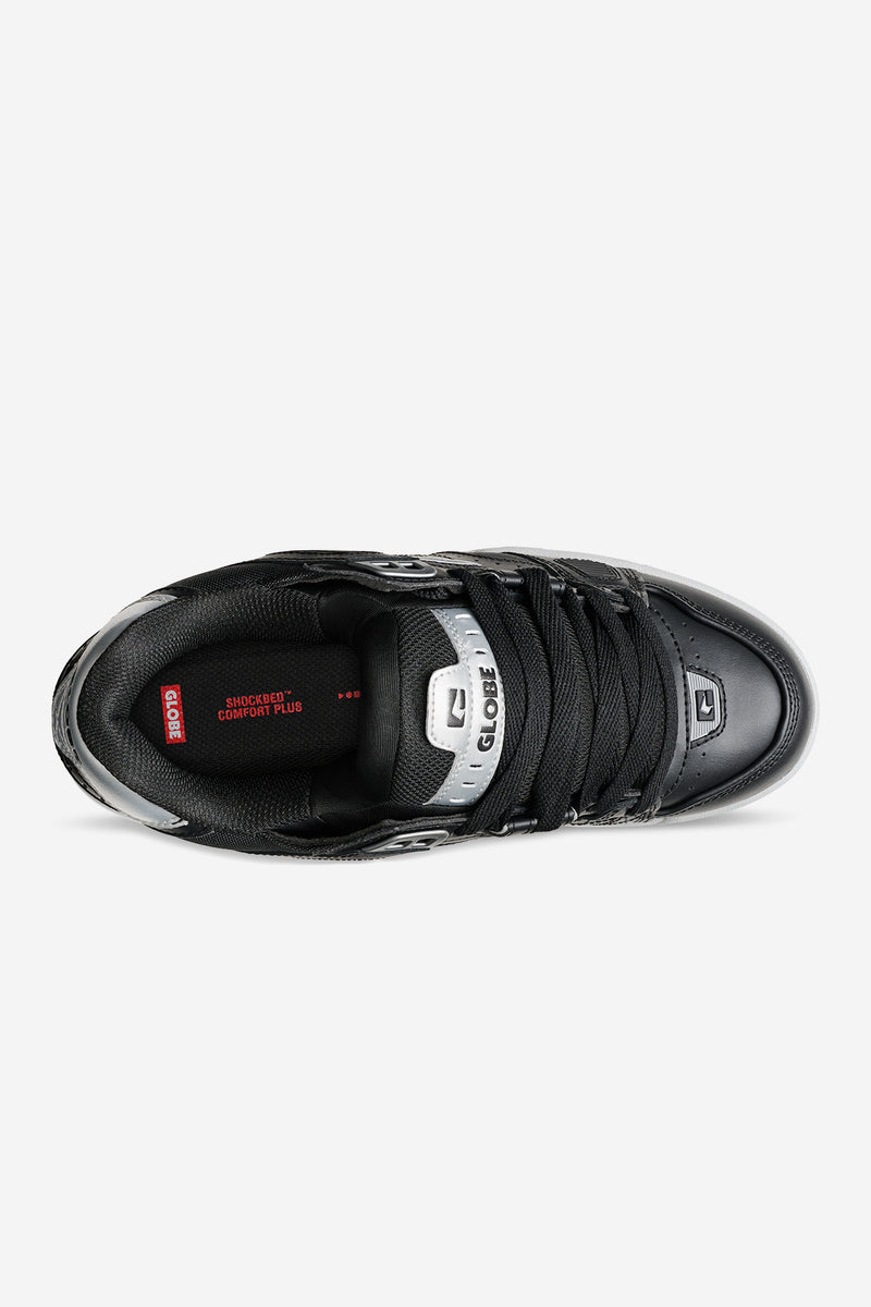 Top view of Sabre skate shoe with black laces and silver accents and the red Shockbed Comfort Plus label inside