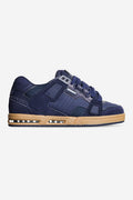 Sabre navy sneaker with gum sole shown in side view.