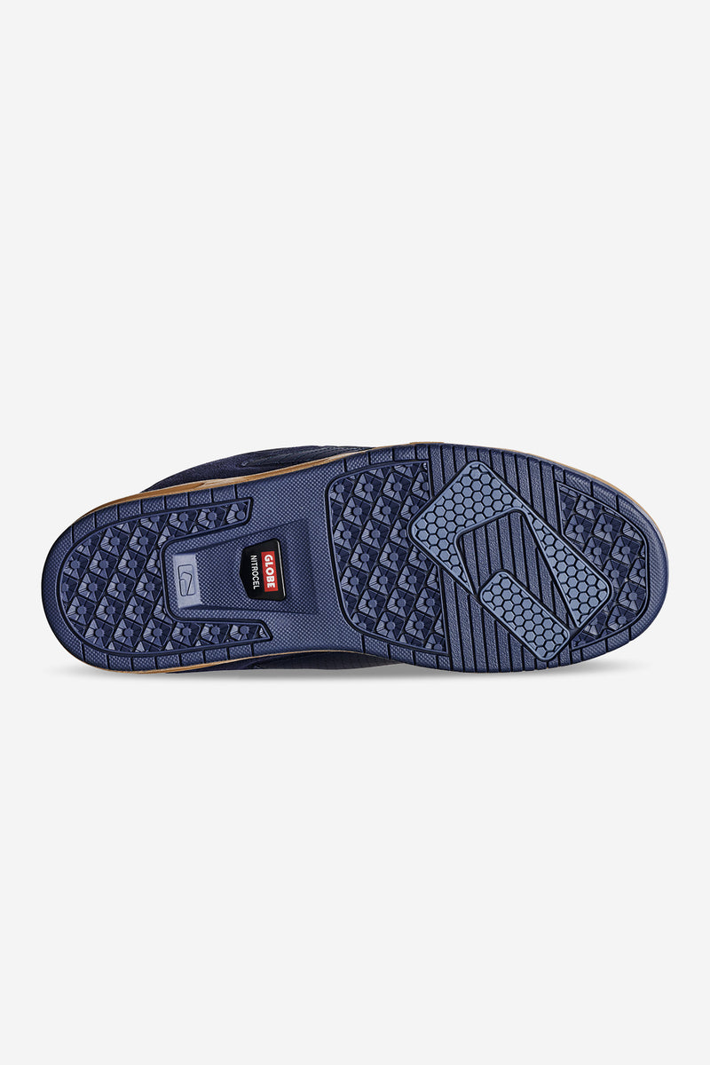 Bottom view of a navy Sabre skate shoe with gum sole and textured tread