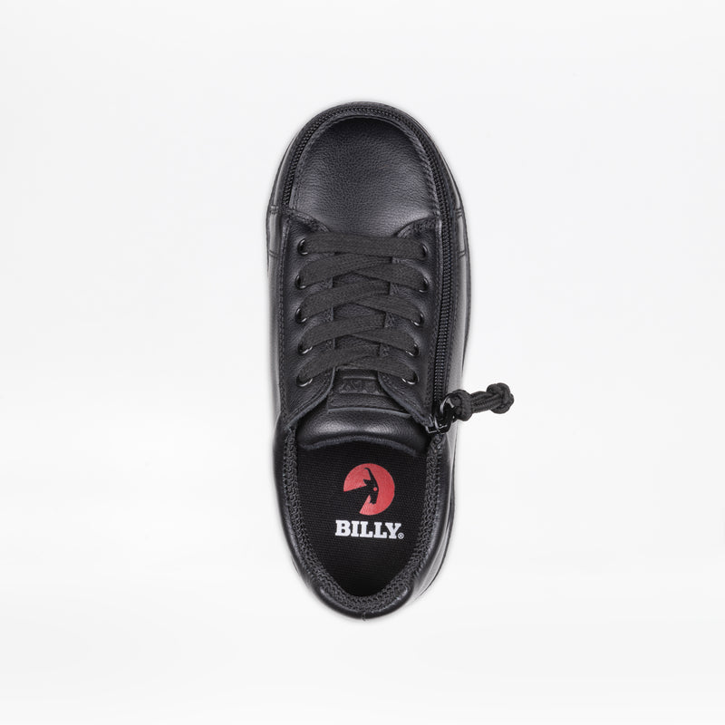 The SALE - Black to the Floor Leather BILLY Classic D|R II Low from BILLY Footwear is a black leather sneaker with black laces, a side zipper with pull tab, wide toe box, and a black insole featuring the red and white BILLY logo. Set on a plain white background.