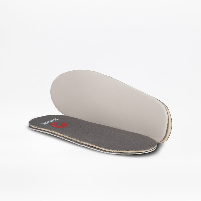 A pair of BILLY Footwear SALE - Dark Grey BILLY D|R II Short Wrap Low kids' adaptive shoe insoles, one flat showing a gray and white top with a small red mark, the other upright revealing its light beige underside on a white background.