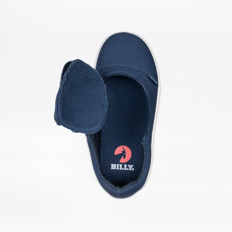 The SALE - Navy BILLY D|R II Short Wrap Low by BILLY Footwear is a kids' adaptive slip-on with a rounded toe and front zipper opening, revealing the insole with "BILLY." Displayed on a white background.