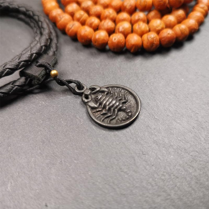Scorpion Guru Amulet 0.8" - Tibetan Buddhist amulet, detailed view