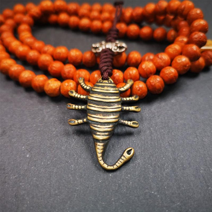 Scorpion Guru Amulet 1.57" - Tibetan Buddhist amulet, detailed view