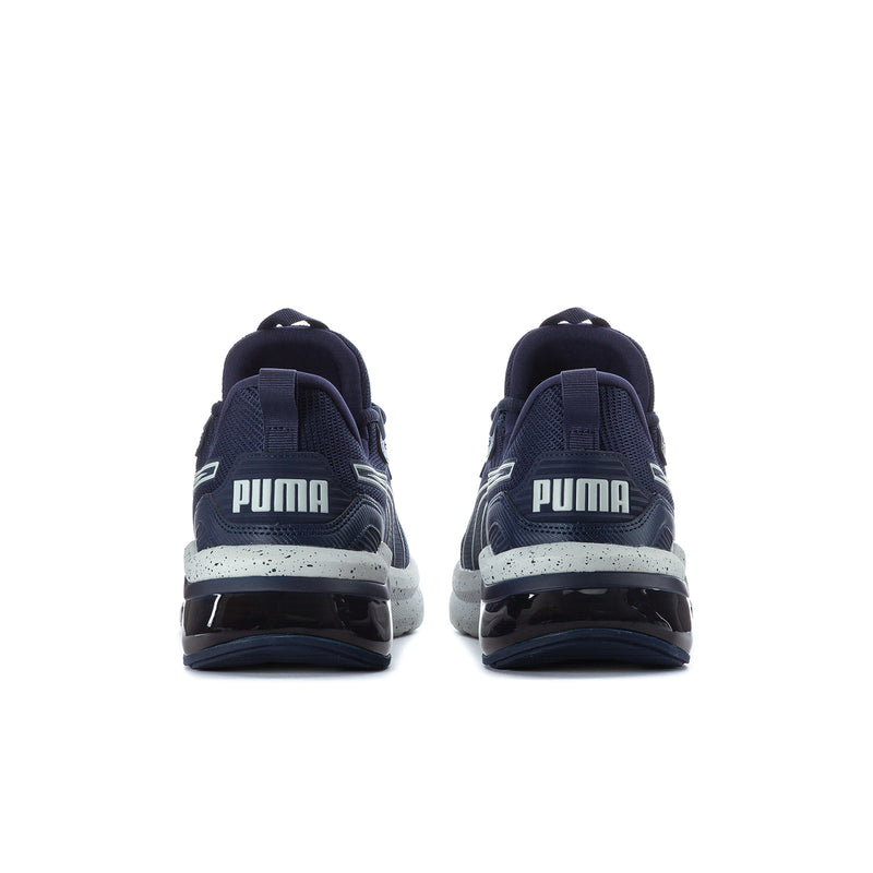 Men's navy sneakers rear view with Puma heel branding and white speckled midsole