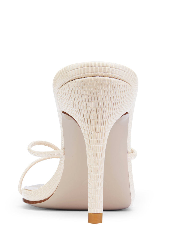 FEMME LA Sicilian Slipper in cream exotic print, back view showing self-covered stiletto heel and gold heel tip