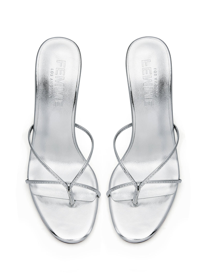 Femme LA Sicilian Slipper in Platinum – overhead view of the pair showing FEMME LOS ANGELES embossed on silver metallic insoles