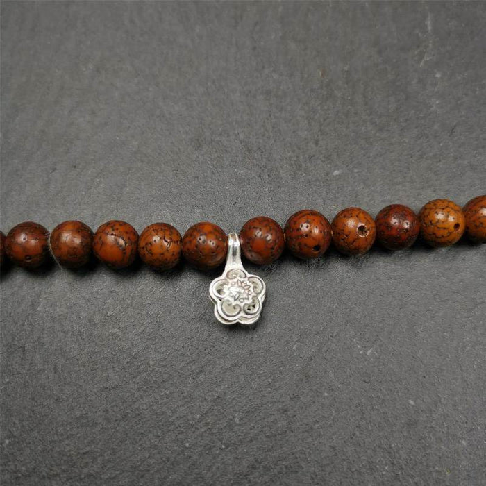 Silver Bead Counter Clips - Tibetan Buddhist art, close-up detail
