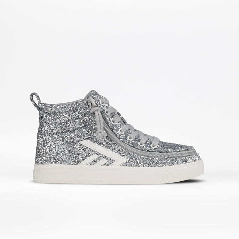 The Silver Glitz BILLY CS High by BILLY Footwear features silver glitter, light gray laces, a white side stripe, and an off-white sole, displayed on a plain white background.