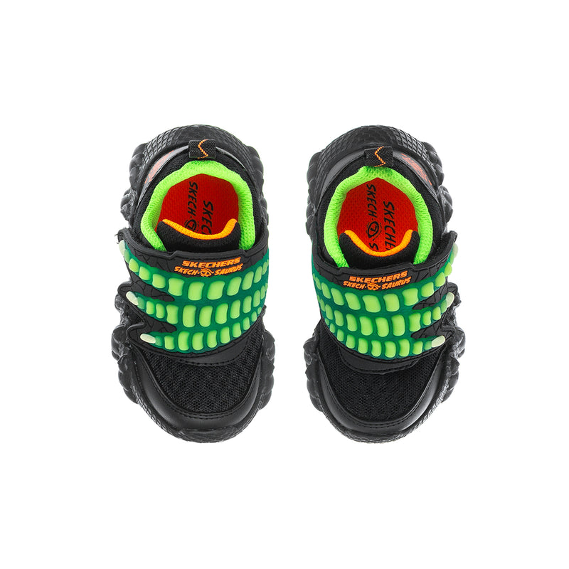 Toddler sneaker pair with black uppers, lime green lining, and dinosaur graphic