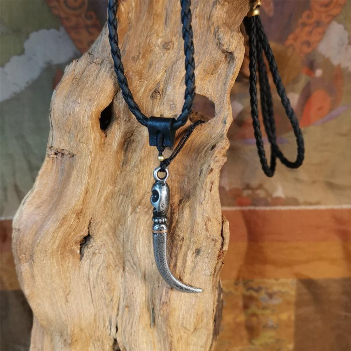 Skull Wolf Tooth Amulet 2.16" - Tibetan Buddhist amulet, close-up detail