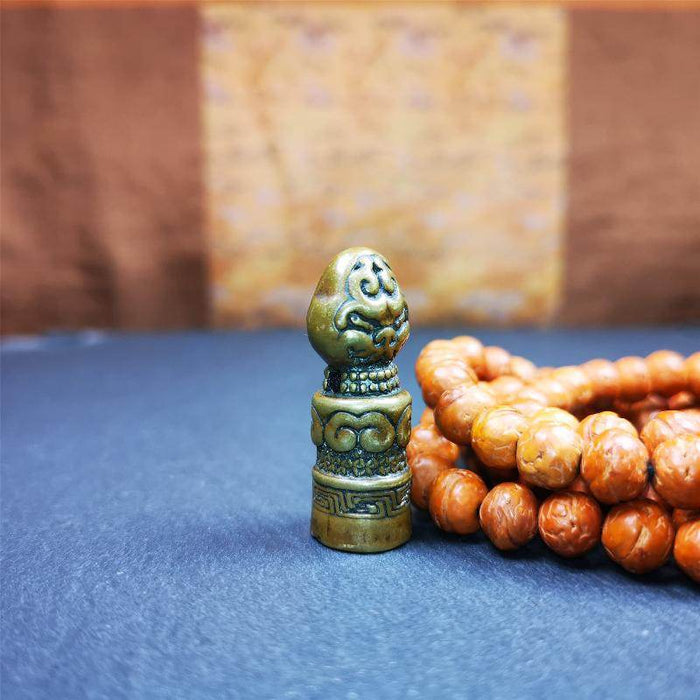 Snow Lion Seal,Lucky Knot Symbol - Tibetan Buddhist art, close-up detail