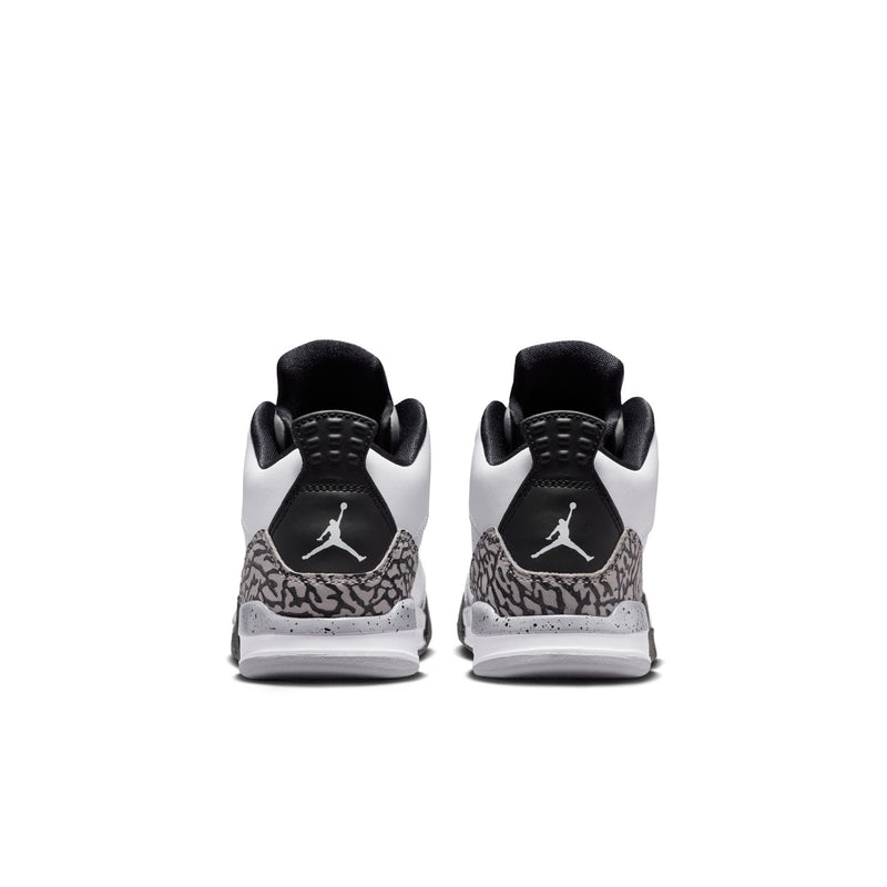 Kids basketball shoes, white/black/cement grey, red Jordan logo on back.