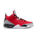 Men’s low-top sneakers in red with black laces, grey speckled panels, and an air unit