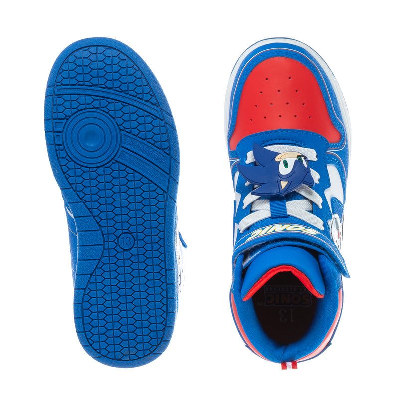 Kids' sneaker soles and inner view, blue outsole tread, red lining