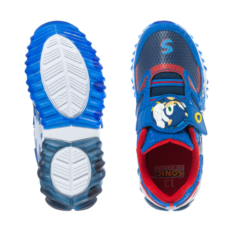 Kids Sonic sneakers soles view: blue outsole, white tread, printed insole with character