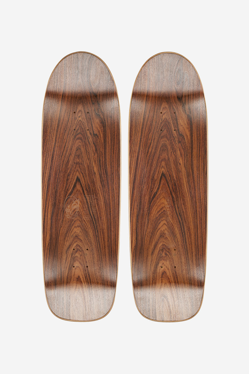 Two rosewood and Canadian maple skateboard decks with rich wood grain from the Sonny Mountain 1 Liner set