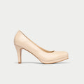 Beige high-heeled shoe on a light gray background