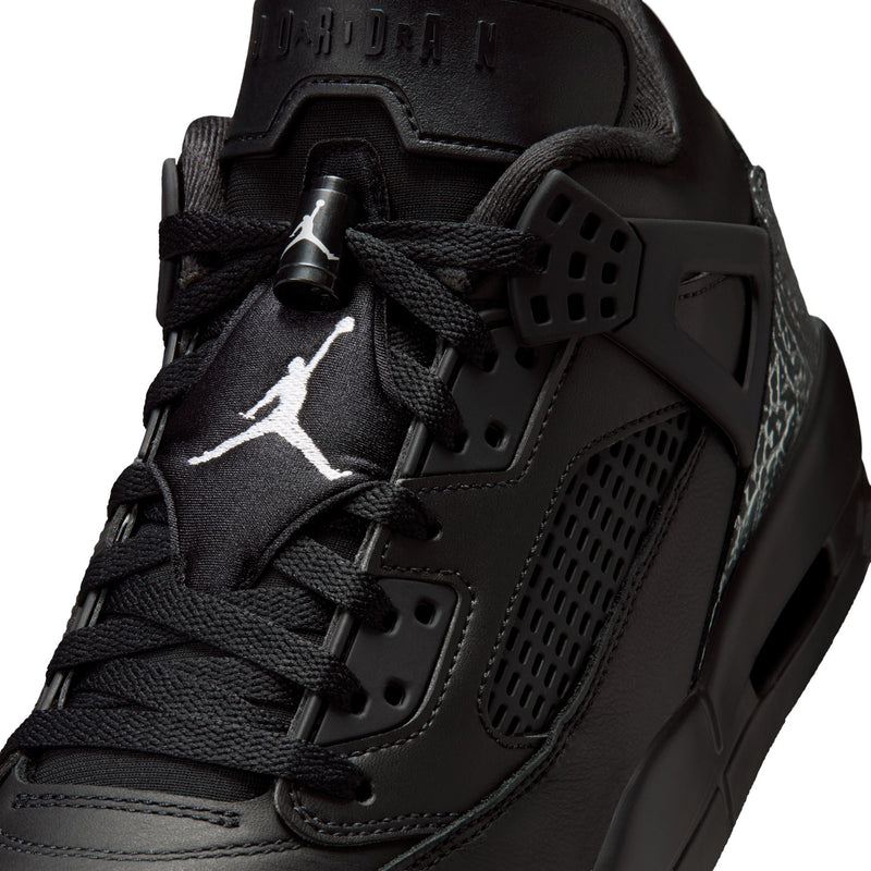 Men's black sneaker upper close-up with JORDAN logos and perforated side