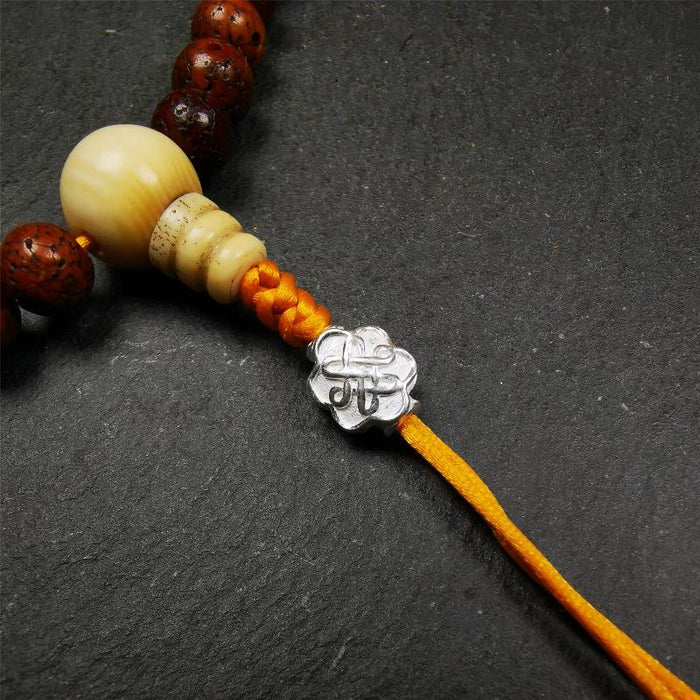 Sterling Silver Lucky Knot Bead,0.4" - Tibetan Buddhist art, detailed view