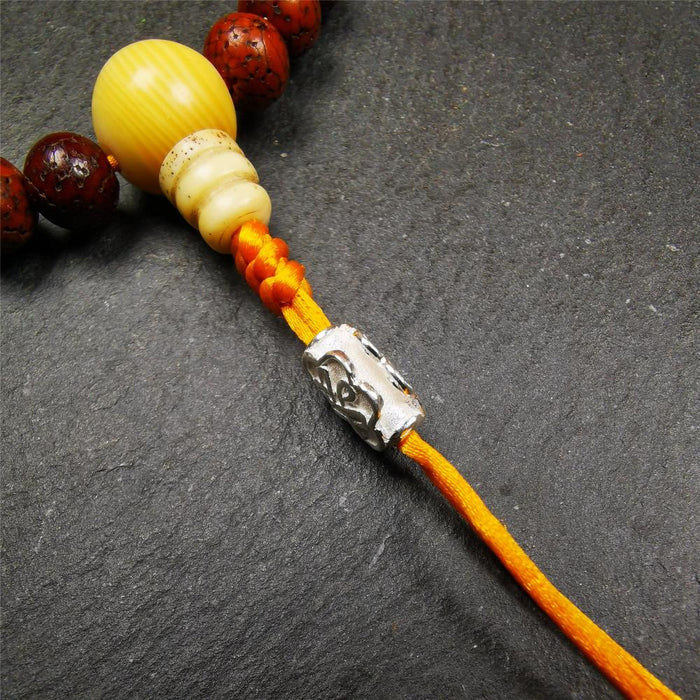 Sterling Silver Lucky Knot Bead,0.4" - Tibetan Buddhist art, close-up detail
