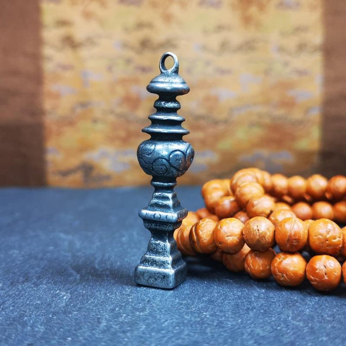 Stupa Amulet 2.16" - Tibetan Buddhist amulet, front view