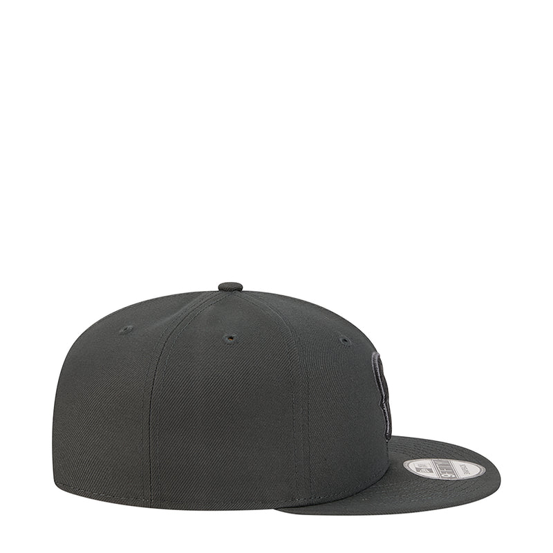 Dark gray baseball cap side profile with curved brim and ventilation eyelets