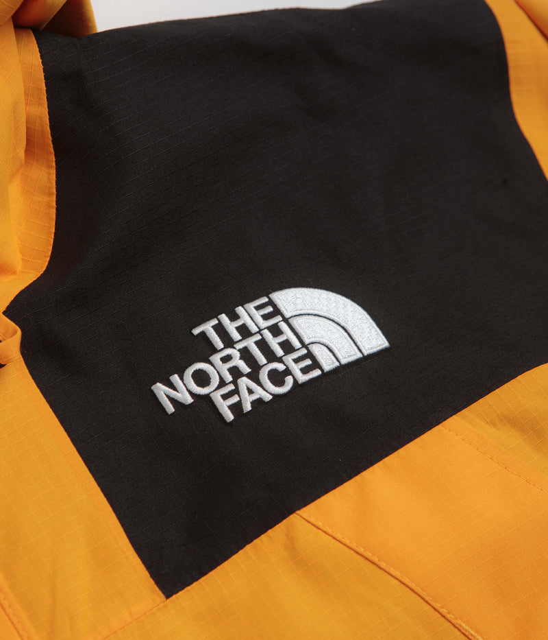The North Face Dryvent Mono Mountain Jacket in Summit Gold and TNF Black