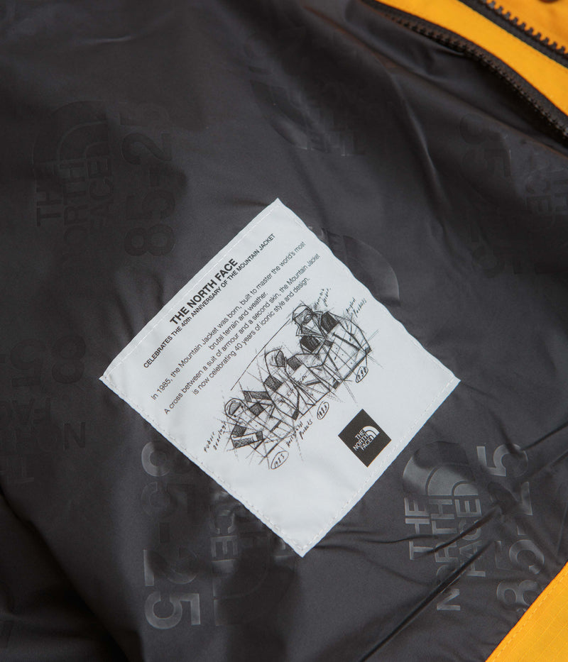 The North Face Dryvent Mono Mountain Jacket in Summit Gold and TNF Black