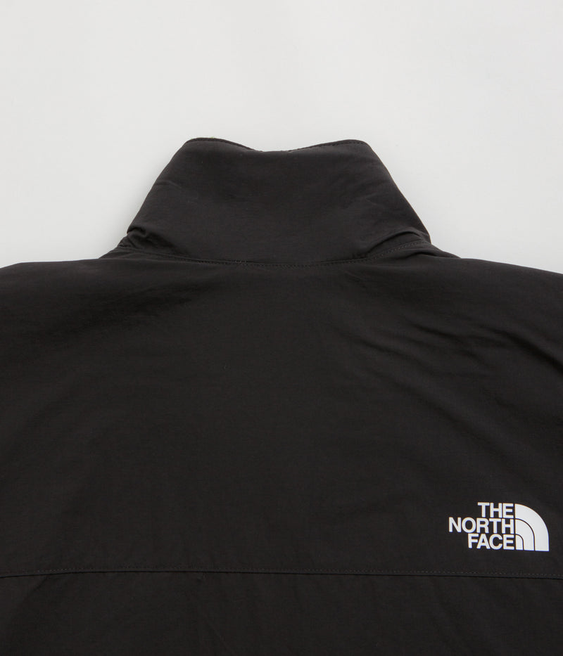 The North Face Yumiori Reversible Jacket in TNF Black and Woodland Green