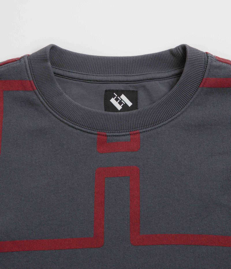The Trilogy Tapes Over Dye Pulse Crewneck Sweatshirt in Black and Red
