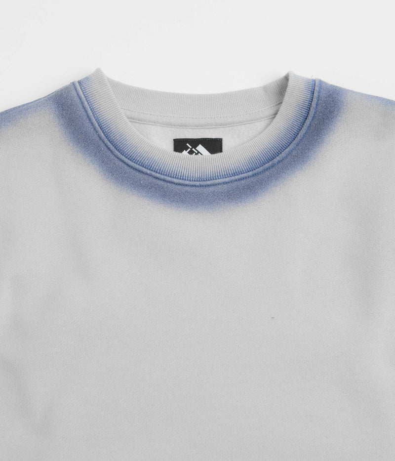 The Trilogy Tapes Overdyed Crewneck Sweatshirt in Grey and Blue