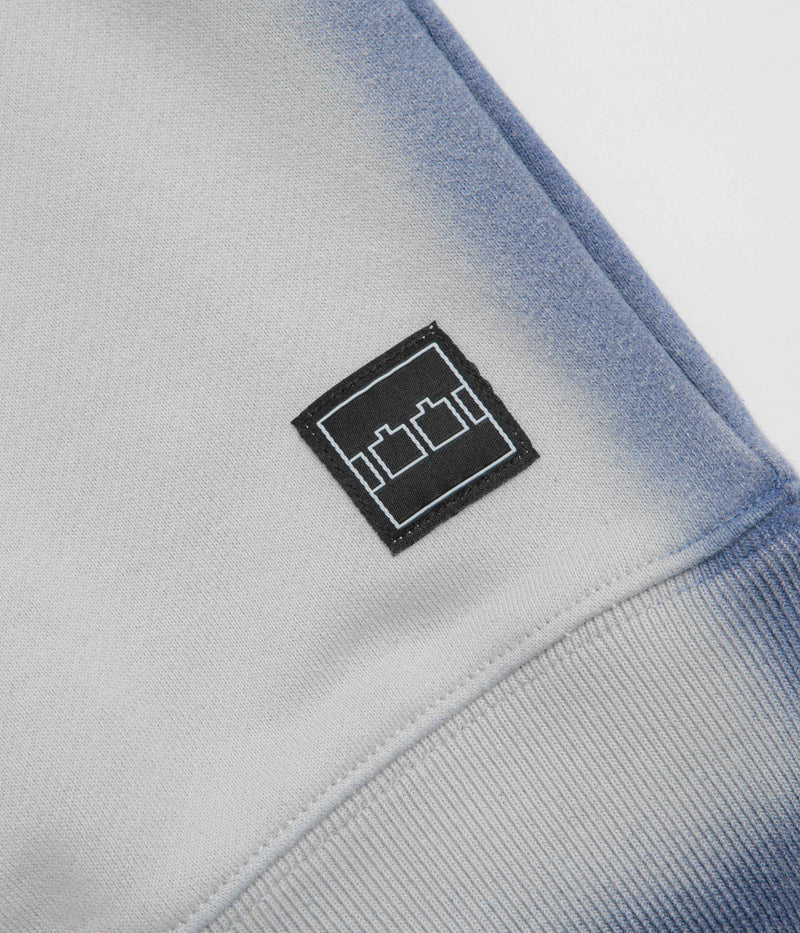 The Trilogy Tapes Overdyed Crewneck Sweatshirt in Grey and Blue