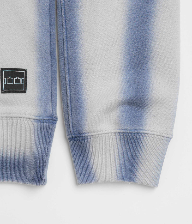 The Trilogy Tapes Overdyed Crewneck Sweatshirt in Grey and Blue