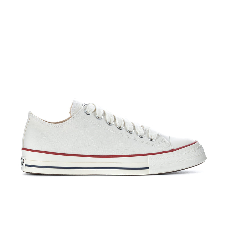 Men's low-top sneakers, white leather with red and navy stripe trim, lace-up.