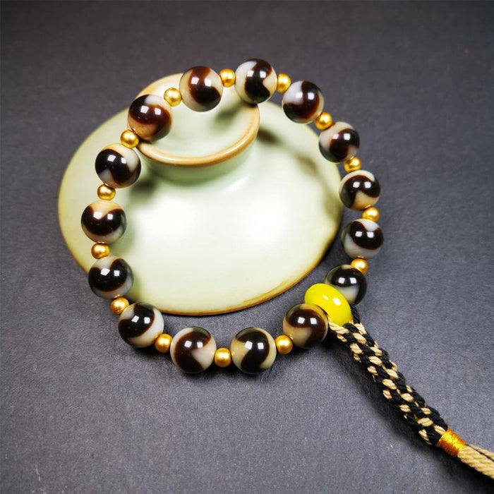 Tiger Tooth Dzi Bead Bracelet 0.4" / 8.7" - Tibetan Buddhist bead necklace, close-up detail
