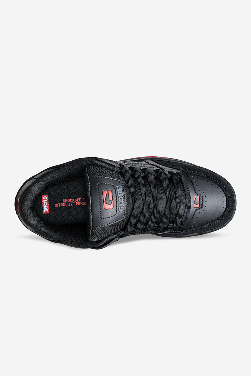 Top view of Tilt skate shoe in black with red accents, showing laces and Globe branding on the tongue