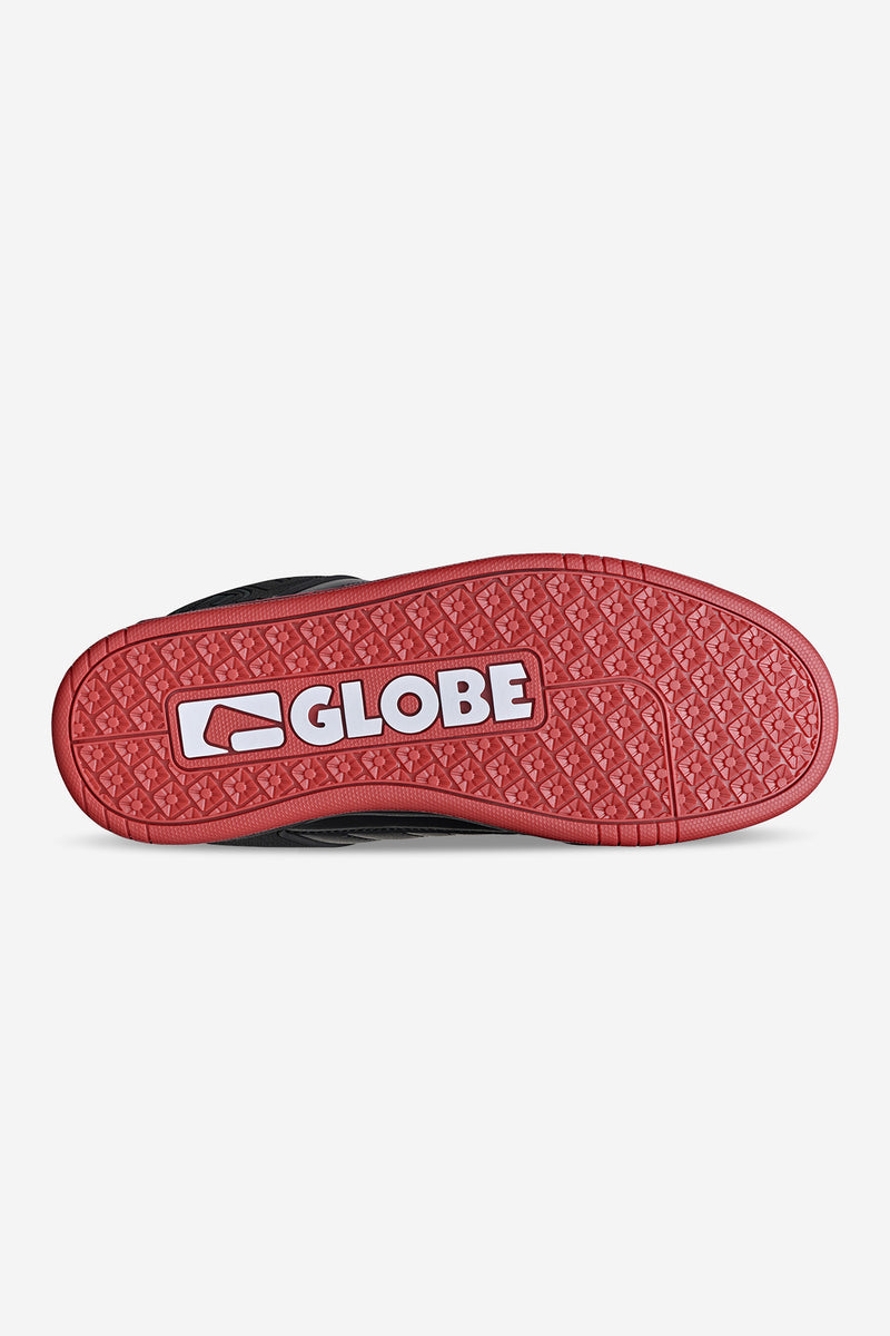 Red outsole bottom view with Globe logo and geometric tread pattern