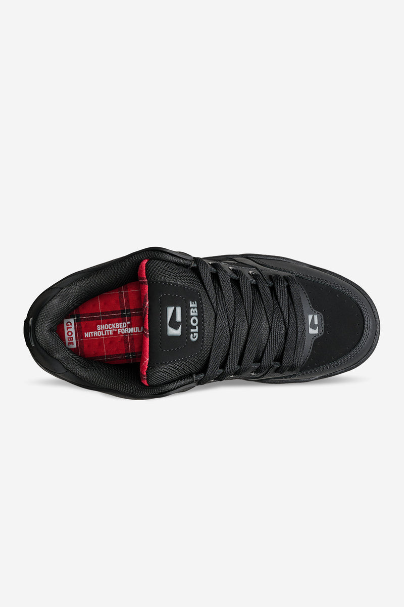 Top view of Tilt black skate shoe showing red tartan lining and Globe branding on the tongue