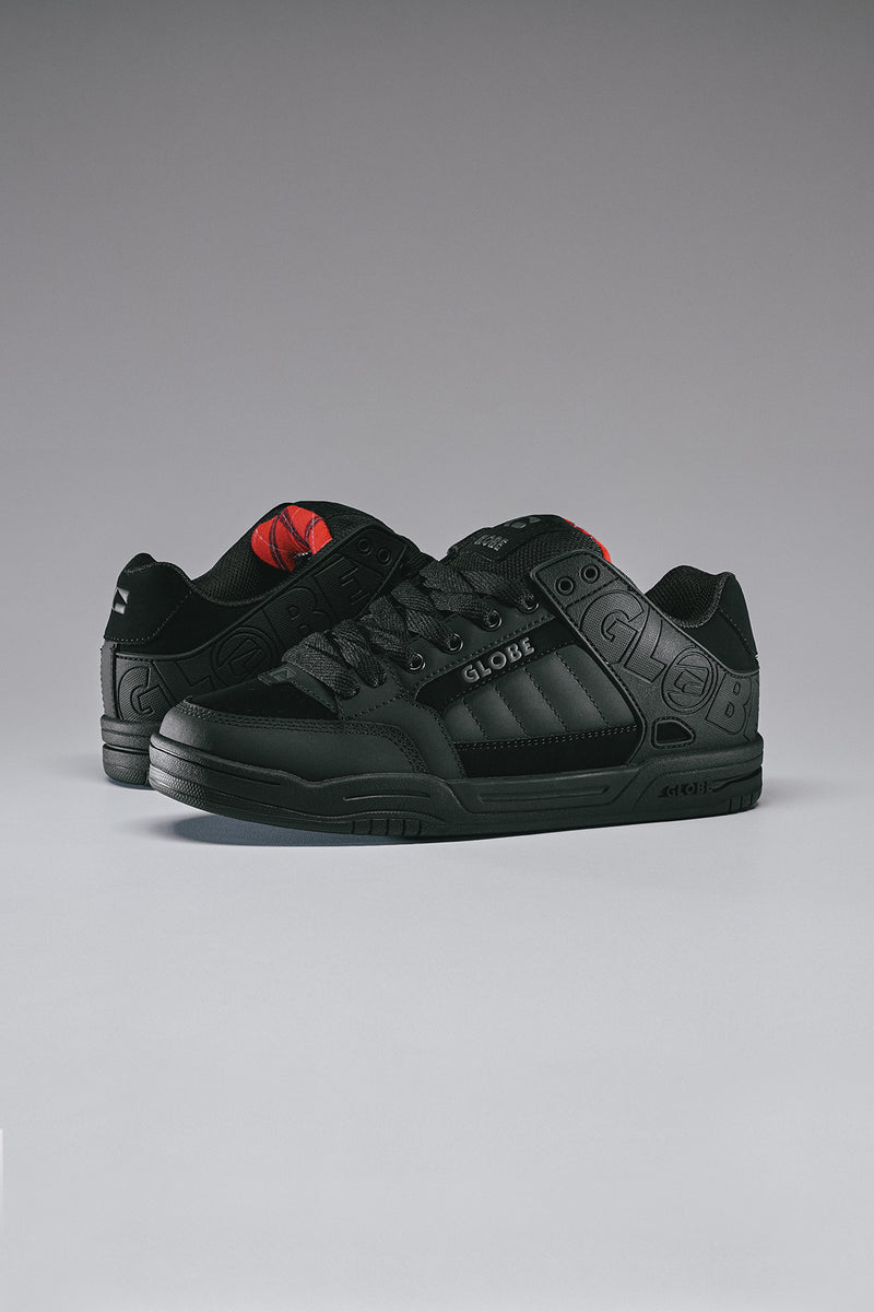 Tilt black skate shoe with red tartan accents and a moulded outside collar for support and a grippy S-Trac outsole
